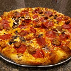Carmines Pizza & Pasta - Pepperoni Sausage and lite mushrooms so good!