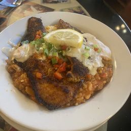 Catfish over grits and jambalaya