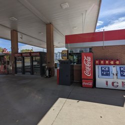 Kroger - Outside Kroger Fuel Center. There's a small little store that sells things like cigarettes + Coke products and ice.