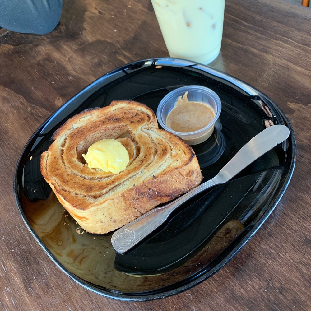 Brot Coffee - Cinnamon Swirl Slice with butter and almond butter - Coffee & Tea Near Me - Orange, California Brot Coffee - Cinnamon Swirl Slice with butter and almond butter - Coffee & Tea Near Me - Orange, California