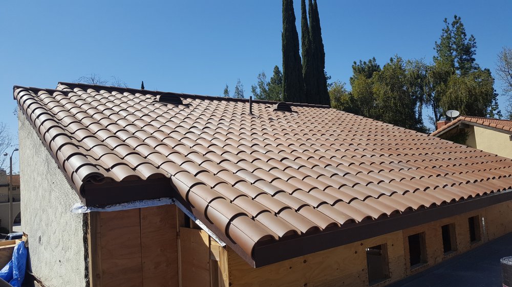 Slide of CJ West Roofing