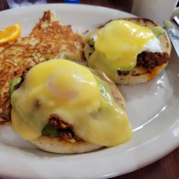 The Mexican Benedict - pupusa topped with chorizo, avocado, a perfectly poached egg, and hollandaise sauce. I could only finish one.