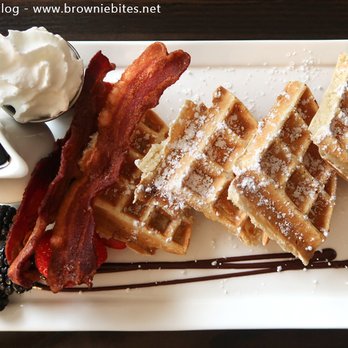 Aviles Restaurant - Pretty waffles with crispy bacon, fruit, and whipped cream - Mediterranean Near Me - St Augustine, Florida