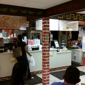 TacoSon - Menu is overhead at the ordering counter. Taco Son also has a drive-up window. - Mexican Near Me - Tampa, Florida