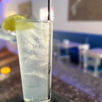 Fishbones Raw Bar And Restaurant - a glass of water with a lime slice - Seafood Near Me - Duck, North Carolina Fishbones Raw Bar And Restaurant - a glass of water with a lime slice - Seafood Near Me - Duck, North Carolina