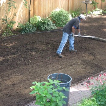 G & C Landscape Care - a man working in the garden - Landscaping Near Me G & C Landscape Care - a man working in the garden - Landscaping Near Me