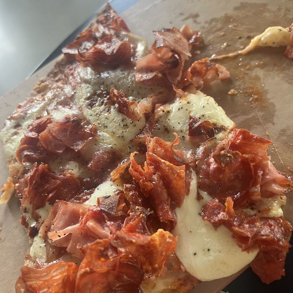 Corbeau Wine Bar - New York flat bread pizza - Wine Bars Near Me - Trussville, Alabama Corbeau Wine Bar - New York flat bread pizza - Wine Bars Near Me - Trussville, Alabama