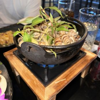 Monkey Lounge - Oc (snails) in lemongrass coconut milk sauce - Lounges Near Me - Randolph, Massachusetts