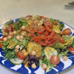 DiAnoia's Eatery - House Salad with Mixed Greens, Olives, Chickpeas, Cherry Tomatoes, Roasted Red Peppers, Cucumbers, and Oregano Vinaigrette