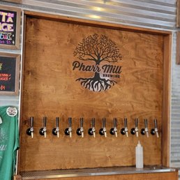 a beer tap in a wooden box