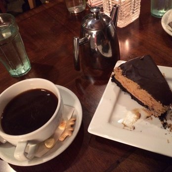 Tryst - Americano, metal teapot with masala chai, and mocha cheesecake - Lounges Near Me - Washington, DC, District of Columbia
