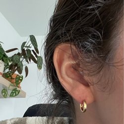 Ageless Art Tattoo & Piercing Studio - Poorly pierced lobe