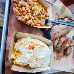 Brisket, jalapeño cheddar sausage, beans and hummus.