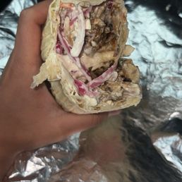 chicken, red onion, tzatziki, garlic sauce,  feta cheese.