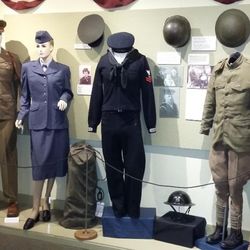 Warrensburg residents fought in wars from the Civil War to the present. Shown here are uniforms from WW I, WW II and Korean conflicts.