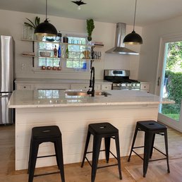 White granite with flecks of black and yellow. White granite with flecks of black and yellow.