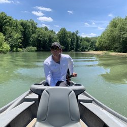 Tennessee on The Fly - Matt guiding drift boat to next sweet spot on Buffalo River