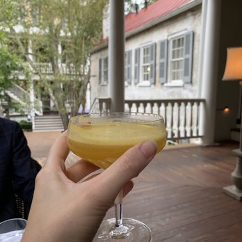Zero Restaurant + Bar - Delicious passion fruit cocktail. We had dinner on the covered porch which offered a charming view of the property. - New American Near Me - Charleston, South Carolina Zero Restaurant + Bar - Delicious passion fruit cocktail. We had dinner on the covered porch which offered a charming view of the property. - New American Near Me - Charleston, South Carolina