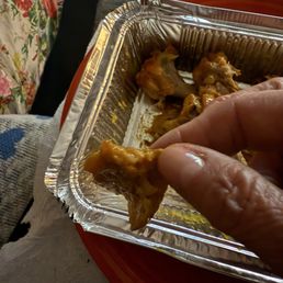 Fat off undercooked chicken wings. Fat off undercooked chicken wings.