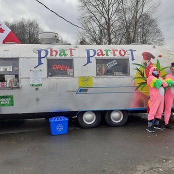 Phat Parrot - two people standing in front of a food truck - Food Trucks Near Me - Courtenay, British Columbia Phat Parrot - two people standing in front of a food truck - Food Trucks Near Me - Courtenay, British Columbia