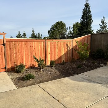Ricca Construction - a backyard with a wooden fence - General Contractors Near Me Ricca Construction - a backyard with a wooden fence - General Contractors Near Me