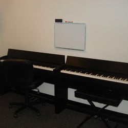 JC's Guitars & Music Lessons - Dual pianos offer a more effective use of the lesson time