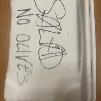 Pizza 101 - A white fabric case features a handwritten signature and the phrase "SAVIOIR ON" in black ink. - Pizza Near Me - Keystone, Colorado