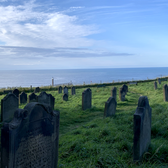 St Mary's Church - The graves look over the sea and the lighthouse - Religious Organizations Near Me - Whitby, NYK