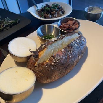 Steak 954 - Giant baked potato - Steakhouses Near Me - Fort Lauderdale, Florida Steak 954 - Giant baked potato - Steakhouses Near Me - Fort Lauderdale, Florida