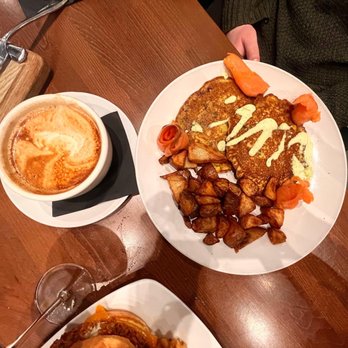 Antilogy - Johnny cakes with sauce, some kinda good coffee. And potatoes with salmon. - New American Near Me - Greenwood, Indiana Antilogy - Johnny cakes with sauce, some kinda good coffee. And potatoes with salmon. - New American Near Me - Greenwood, Indiana