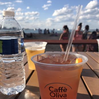 Caffè Oliva - Enjoying an Island Rum Punch by the bar. - Mediterranean Near Me - Chicago, Illinois Caffè Oliva - Enjoying an Island Rum Punch by the bar. - Mediterranean Near Me - Chicago, Illinois