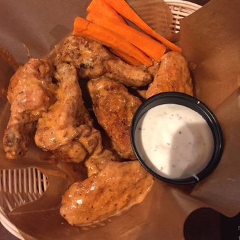 Colonel Wings - a basket of chicken wings and carrots - Chicken Wings Near Me - Bowmanville, Ontario