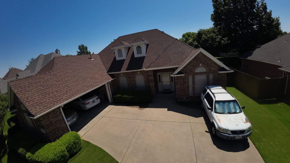 Slide of All Slopes Roofing