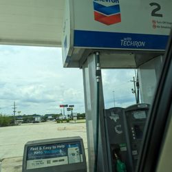 Chevron - Gas pump at exterior of Food Mart