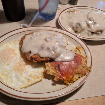 Darbi's Cafe - Chicken fried steak, potato cake and eggs over medium. Plus biscuits and gravy (included) - American Near Me - Pinetop, Arizona