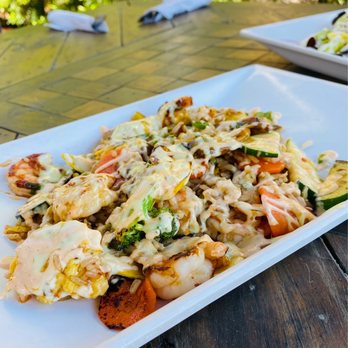 Chive - a plate of food on a table - Salad Near Me - Vero Beach, Florida
