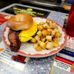 Gab & Eat - Bacon, Egg, & Cheese Bagel with a side of breakfast potatoes