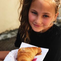 Dardonville - Just a happy girl with her buttery flaky croissant for under €1.50