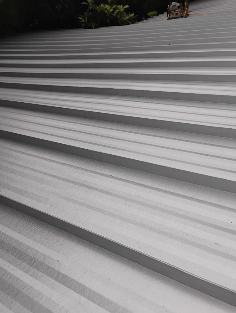 Slide of Triple J Roofing