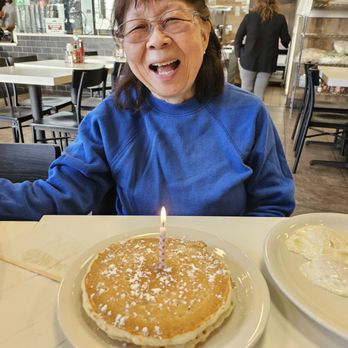 Aloha Stacks - Buttermilk.Pacakes with a Birthday Candle - Pancakes Near Me - Cerritos, California Aloha Stacks - Buttermilk.Pacakes with a Birthday Candle - Pancakes Near Me - Cerritos, California
