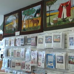 Quilting B & More - More great quilted panels from the Anne fabric hanging on the walls of the shop & some of the patterns they sell.