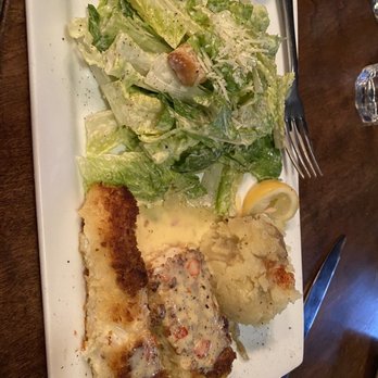Waterfront Depot Restaurant - Delish! Crab encrusted halibut, side Caesar and Yukon mashed. - Seafood Near Me - Florence, Oregon