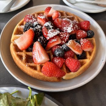 4747 LIC - a waffle topped with strawberries and blueberries - Mediterranean Near Me - Long Island City, New York