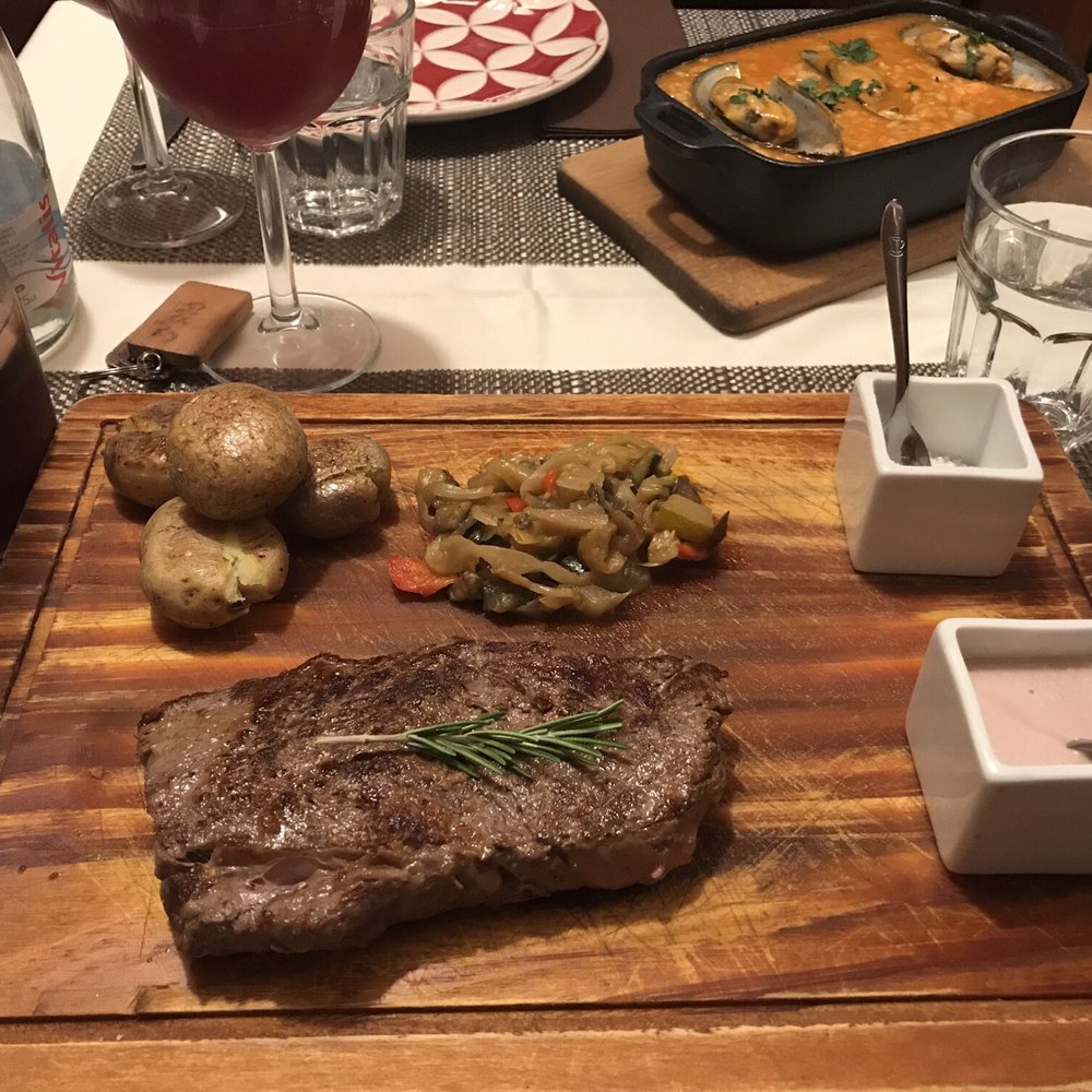 Steak with port wine sauce, seafood rice