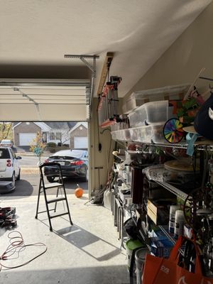 Installing a ladder holder - Customer needed to store ladder under ceiling and I helped him in it.