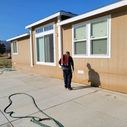 Bye Bye Pest Control - Doing an exterior foundation treatment.