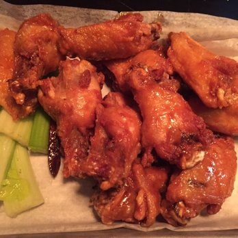 Eli Cannon's - Sweet and spicy wings. I waited almost an hour for these and they were undercooked and nasty - American Near Me - Middletown, Connecticut
