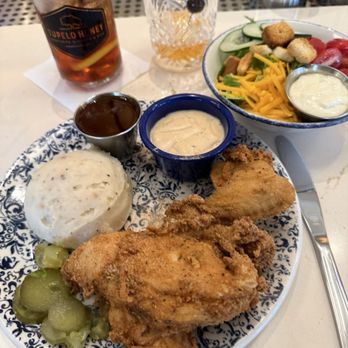 Tupelo Honey Southern Kitchen & Bar - Fried chicken, mashed potatoes, gravy, honey, Sriracha, and salad. - New American Near Me - Huntsville, Alabama Tupelo Honey Southern Kitchen & Bar - Fried chicken, mashed potatoes, gravy, honey, Sriracha, and salad. - New American Near Me - Huntsville, Alabama