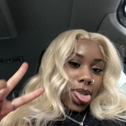 China Doll Tattoo & Piercing - Piercings: Smiley & Snake Bite on tongue