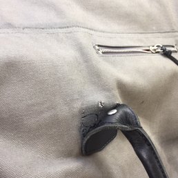 Before- leather handle and river were undone Before- leather handle and river were undone